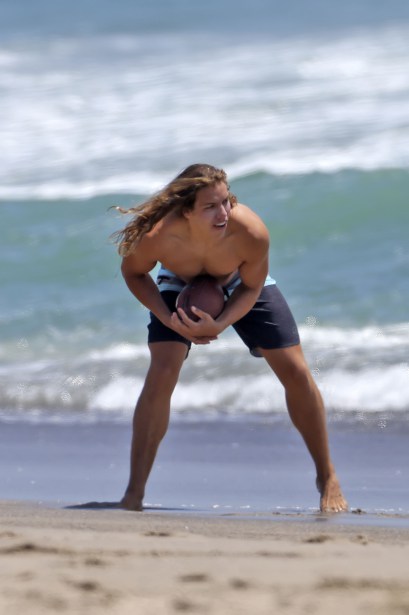Exclusive... Joseph Baena Plays Football Shirtless On Malibu Beach  ***NO WEB USE W/O PRIOR AGREEMENT - CALL FOR PRICING***
